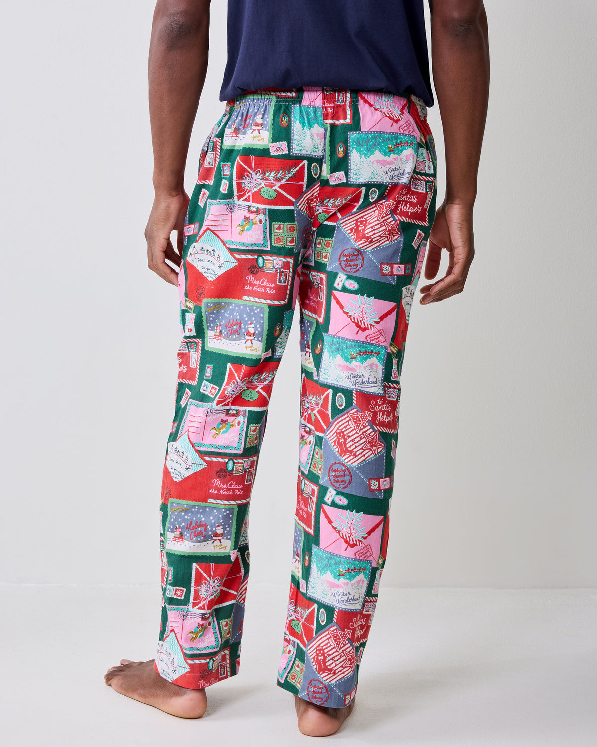 Close back view of the printed pajama pants, showing the waistband, seat, and leg print.