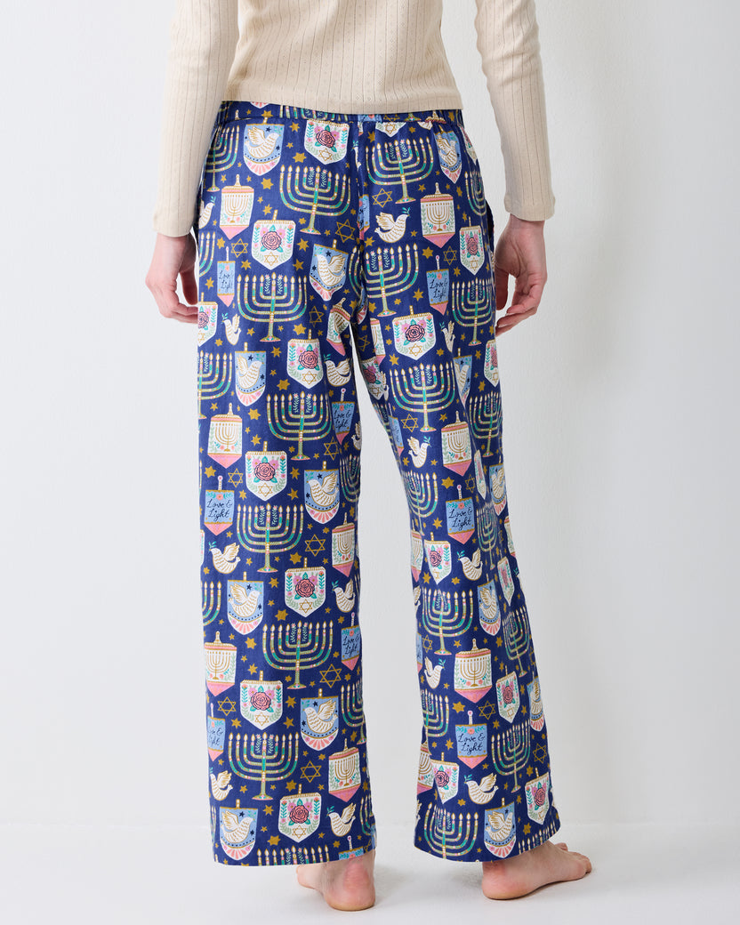 Back view of Hanukkah Blue Astrid wide-leg pajama pants showing the full rear pattern and straight hems.