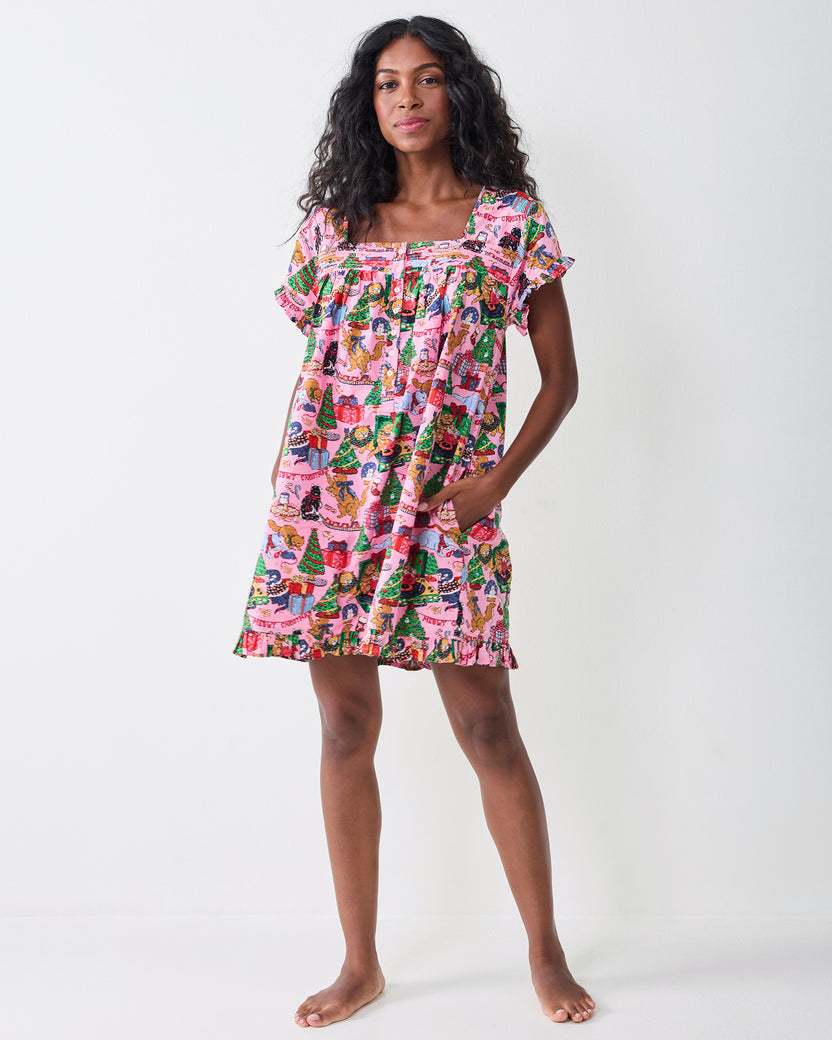 Front view of the Candy Pink Meowy Christmas pintuck nightgown, with a square neckline, gathered yoke, short ruffled sleeves, and side pockets.