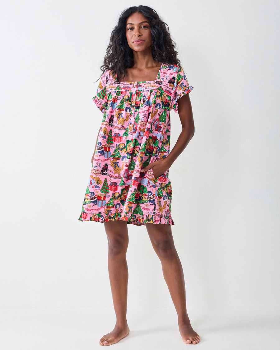 Front view of the Candy Pink Meowy Christmas pintuck nightgown, with a square neckline, gathered yoke, short ruffled sleeves, and side pockets.