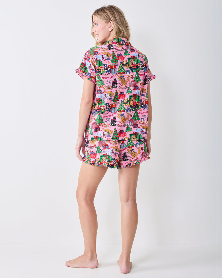 Back view of the Candy Pink Meowy Christmas ruffle short set, showing the patterned top and matching ruffle-hem shorts.