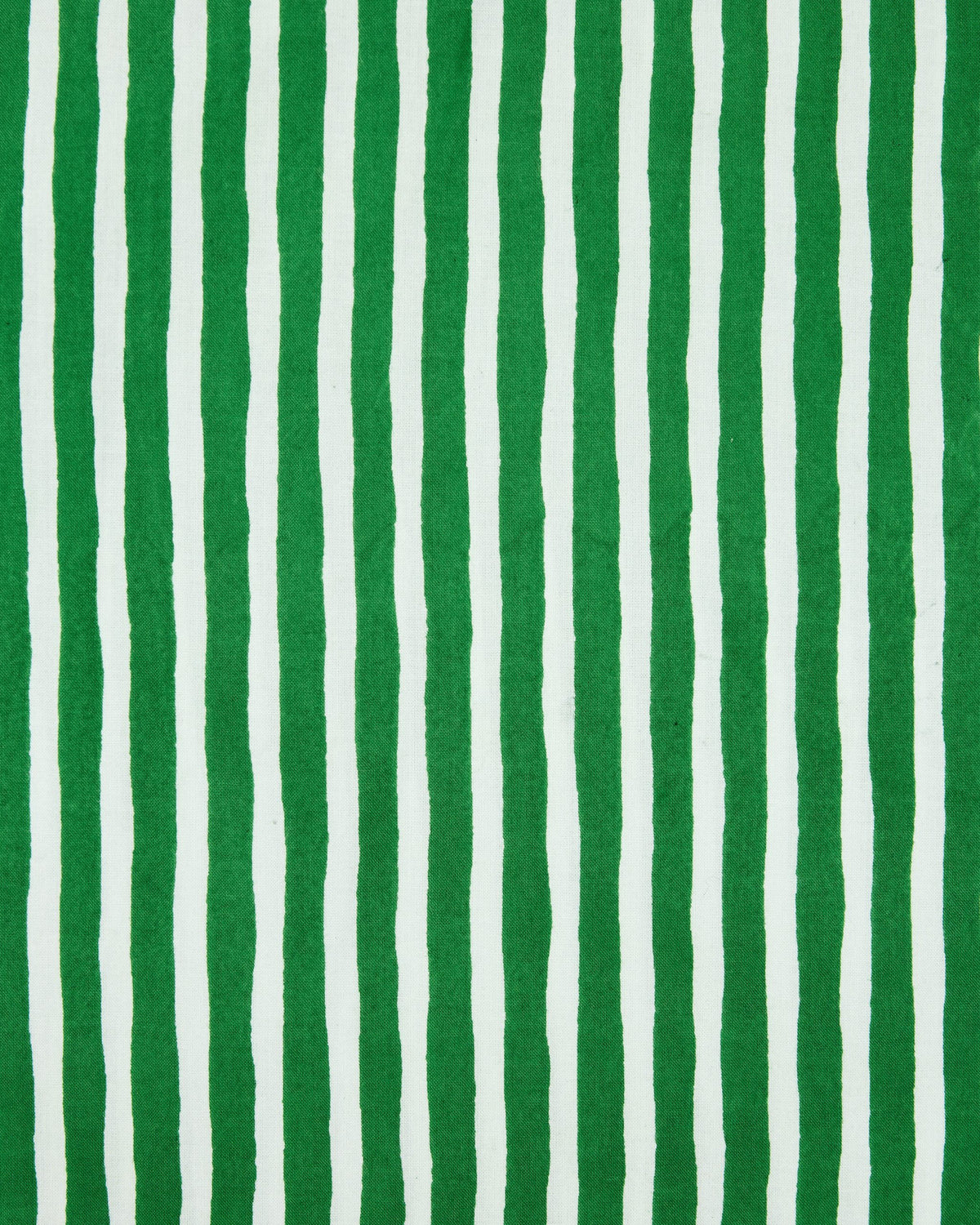 Close-up of green-and-white vertically striped fabric for the Nola pajama pants.