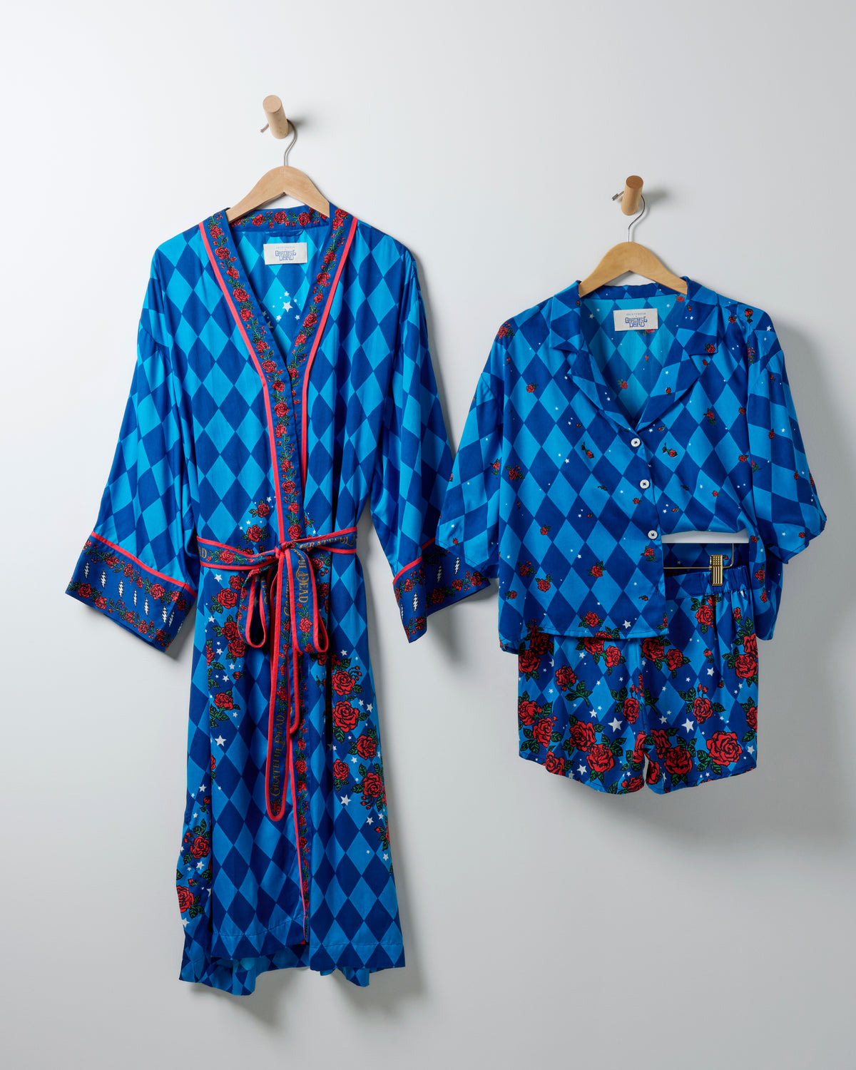 Psychedelic Roses blue argyle robe and matching short pajama set with rose-patterned trim.
