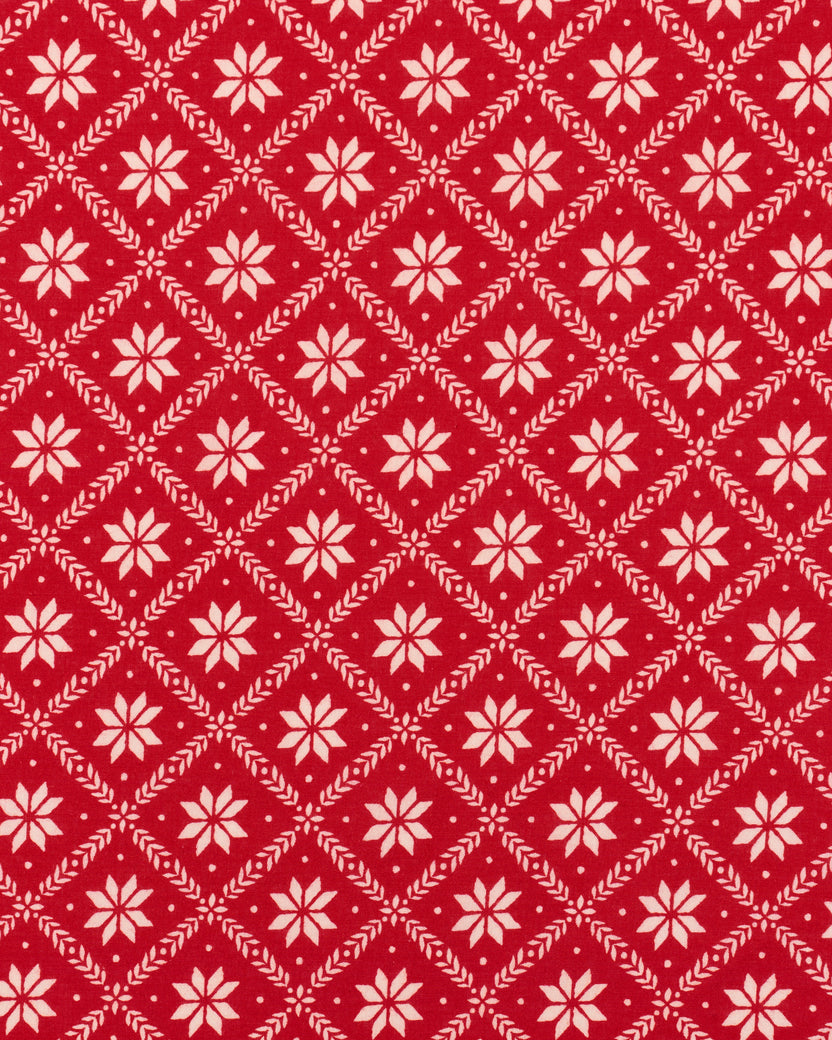 Close-up of the red and white snowflake pattern from the Parker nightgown