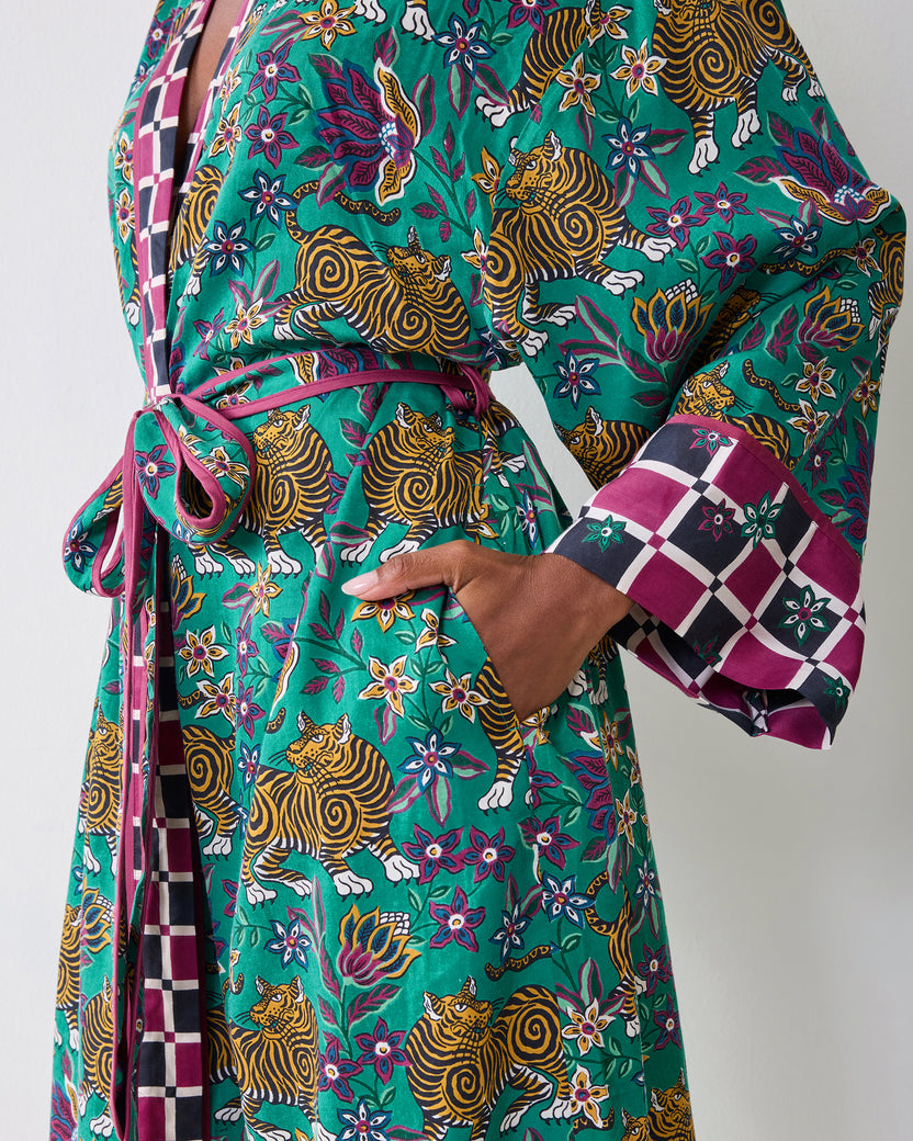 Close-up of the Royal Teal Tibetan Tigress Eco Satin Robe showing the waist tie, side pocket, tiger print, and checkered cuff.