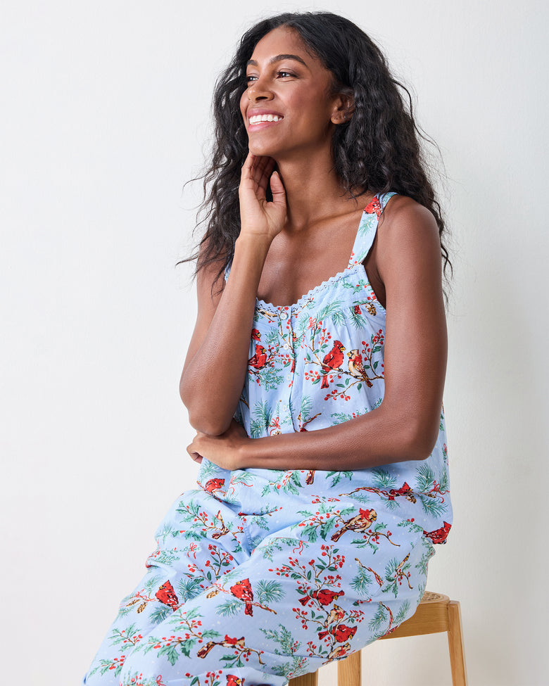 Side view of the frosted blue Winter Cardinals cropped pants set, showing the camisole top and matching cropped pants while seated.