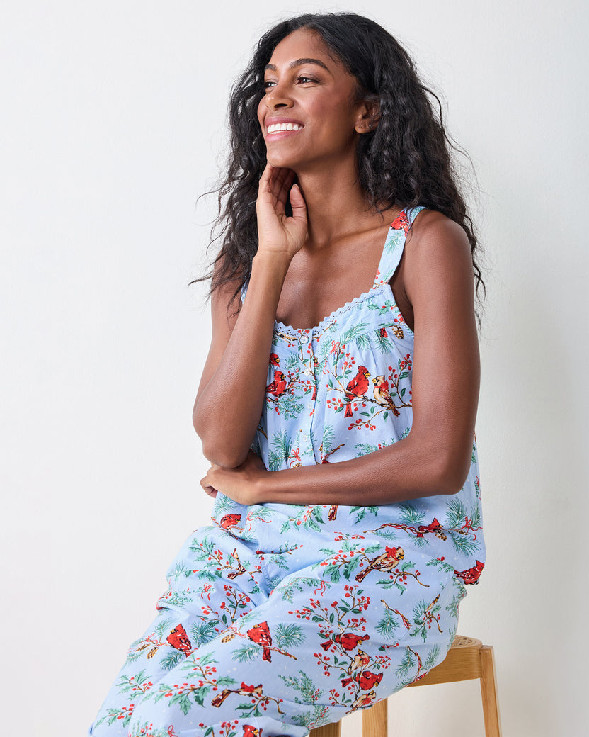 Side view of the frosted blue Winter Cardinals cropped pants set, showing the camisole top and matching cropped pants while seated.