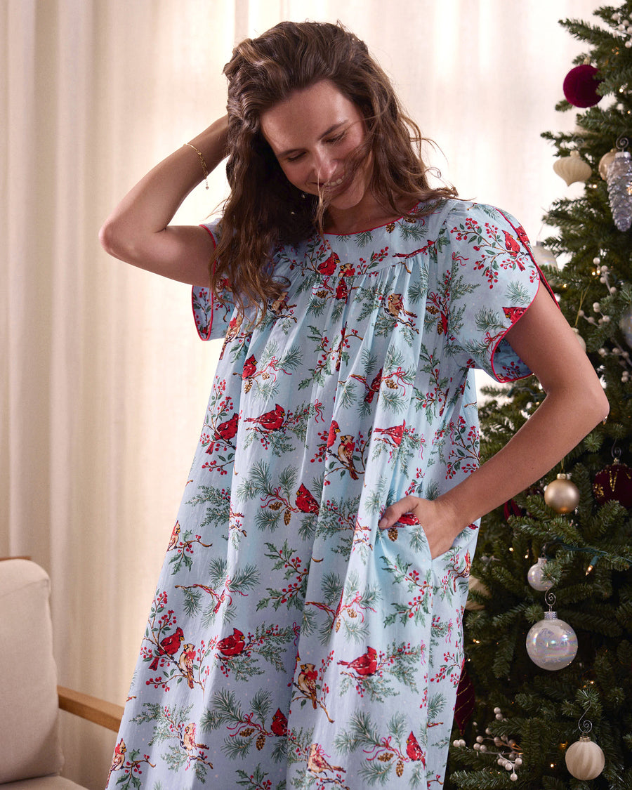 Close front view of the Winter Cardinals Retro Dreams nightgown showing its gathered neckline, short sleeves, and bird-and-branch print.