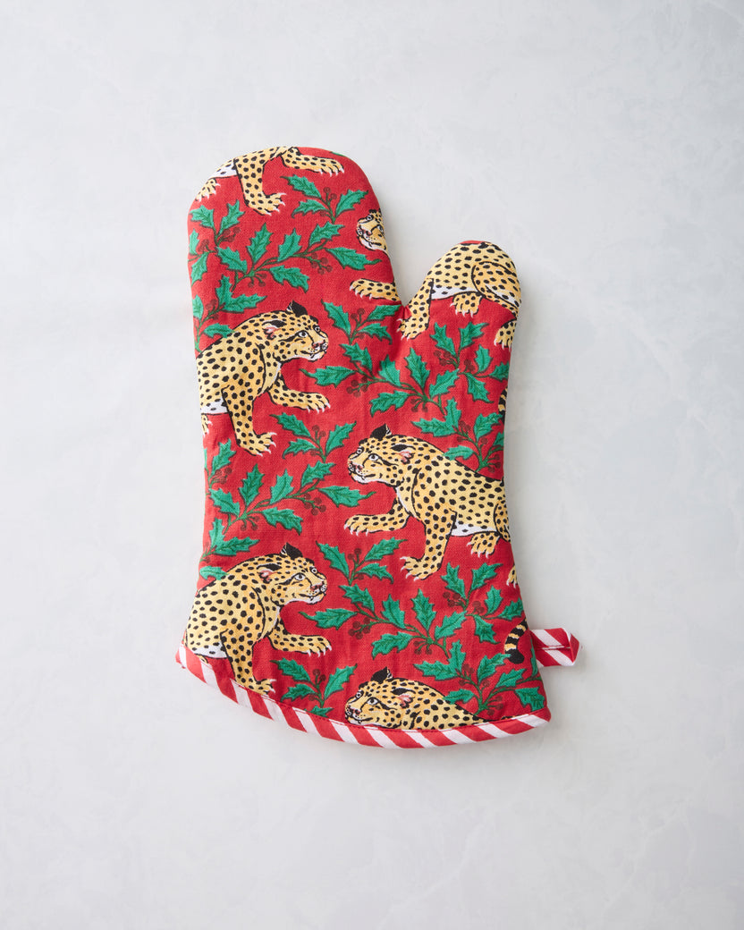 Ruby Winter Holly Bagheera oven mitt with a red holly-leaf print and leopard illustrations.