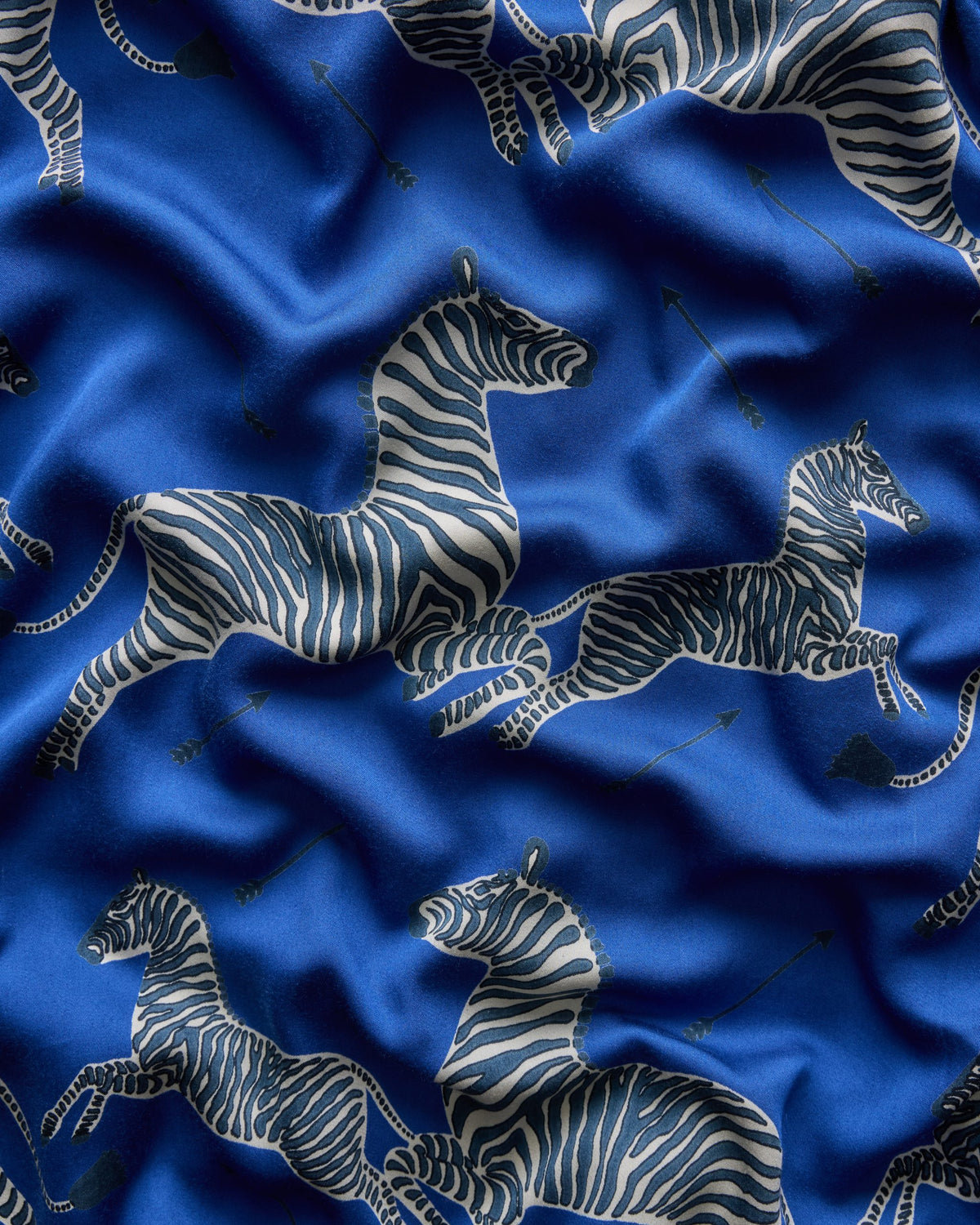 Close-up of the blue zebra-and-arrow print used on the boyfriend boxer shorts.