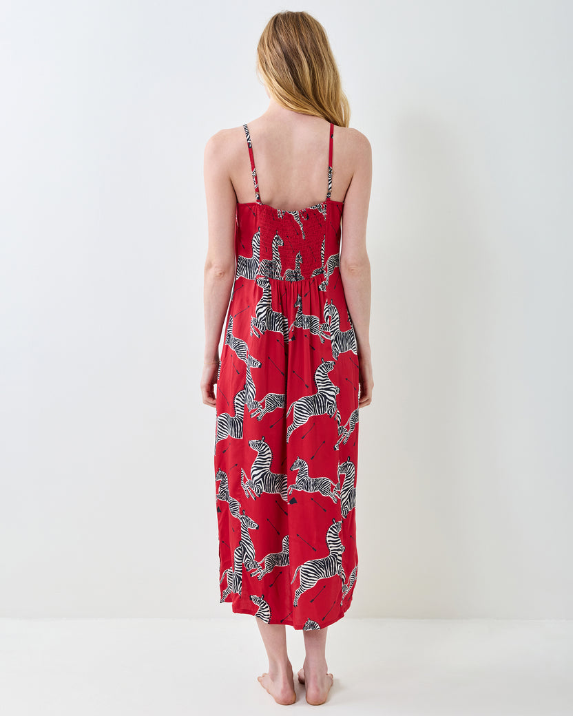 Back view of a red zebra-print nightie with thin straps and a gathered waist.