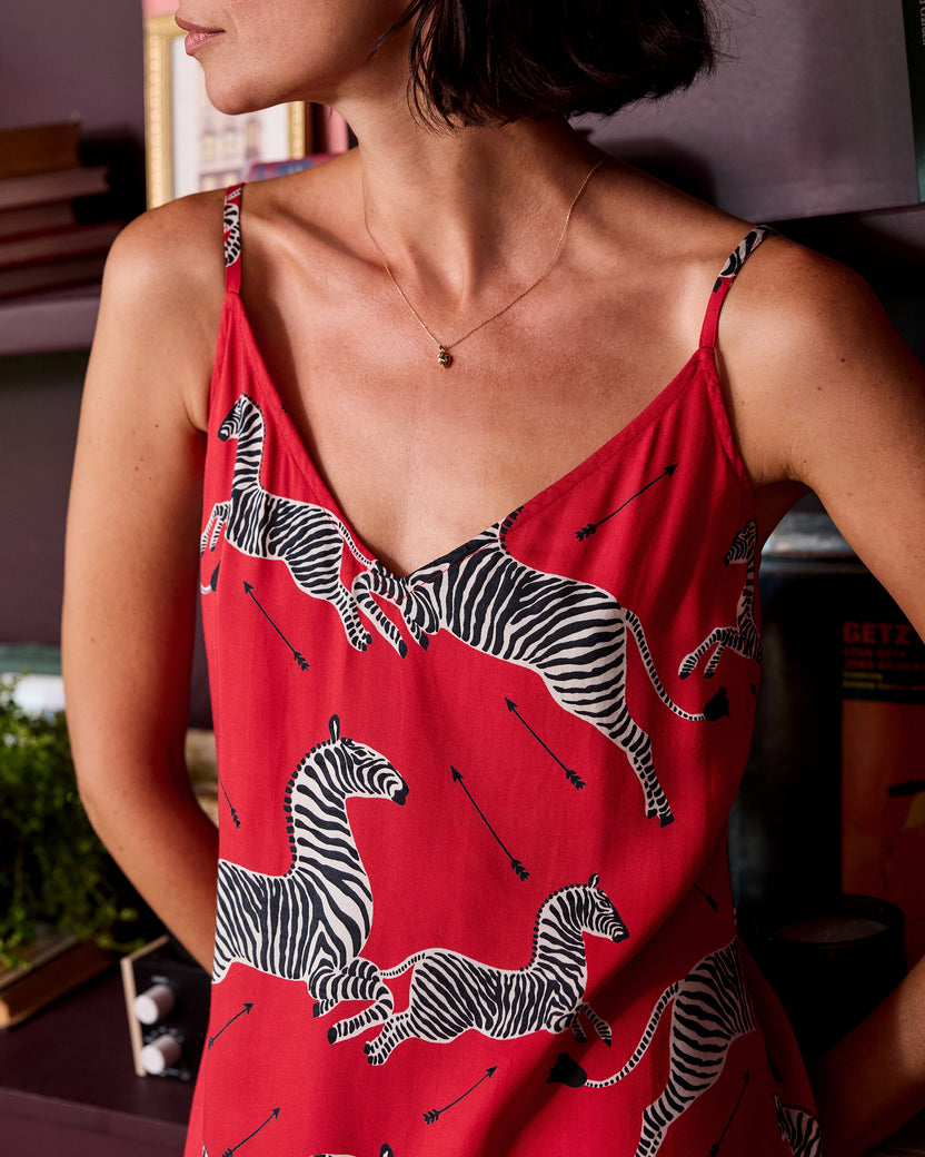 Close-up of the red zebra-print nightie showing its thin straps and neckline.