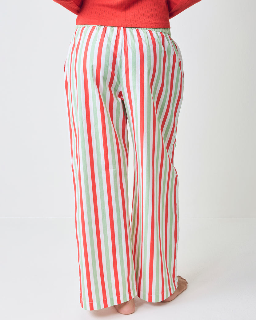 Back view of Elf Stripes Nola pajama pants with vertical sage and cherry stripes and an elastic waistband.