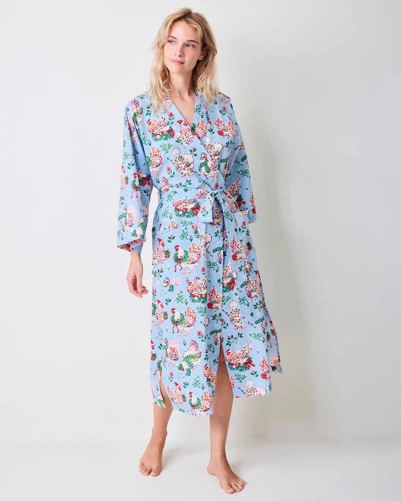 Full-length view of the pale blue Holiday Hens long robe with a floral hen print, wrap front, belt, and long sleeves.