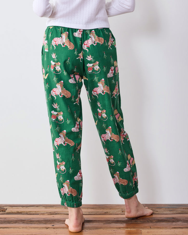 Back view of green printed joggers with an elastic waistband and gathered ankle cuffs.