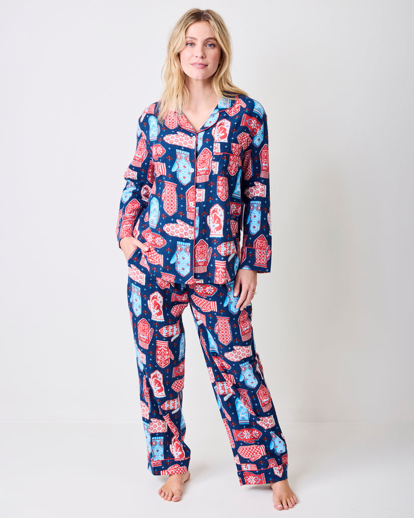 Full-length front view of a person wearing the Viking Blue Nordic Mittens long pajama set.