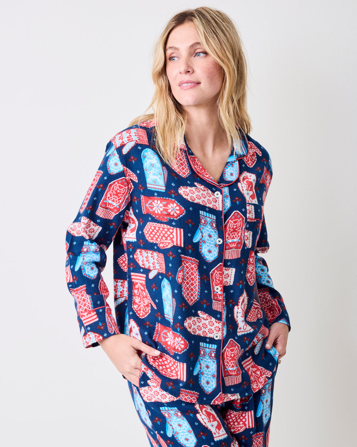 Front view of a person wearing the Viking Blue Nordic Mittens long pajama set with a button-front top and matching pants.