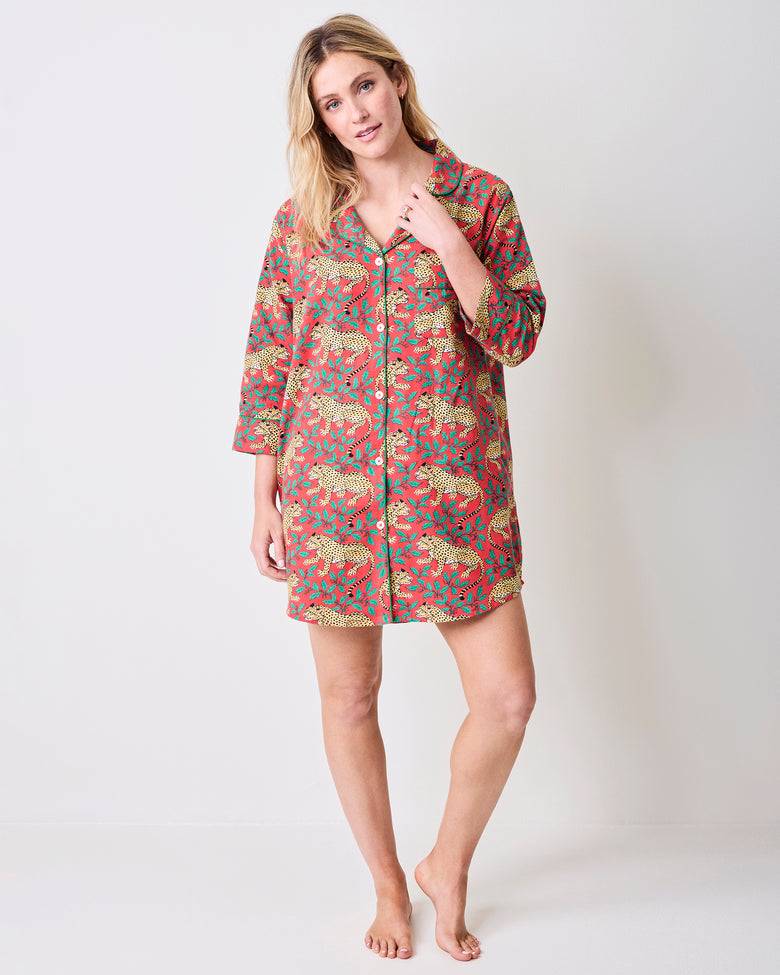 Ruby button-front sleep shirt with three-quarter sleeves, pockets, and a leopard-and-floral print, shown full length