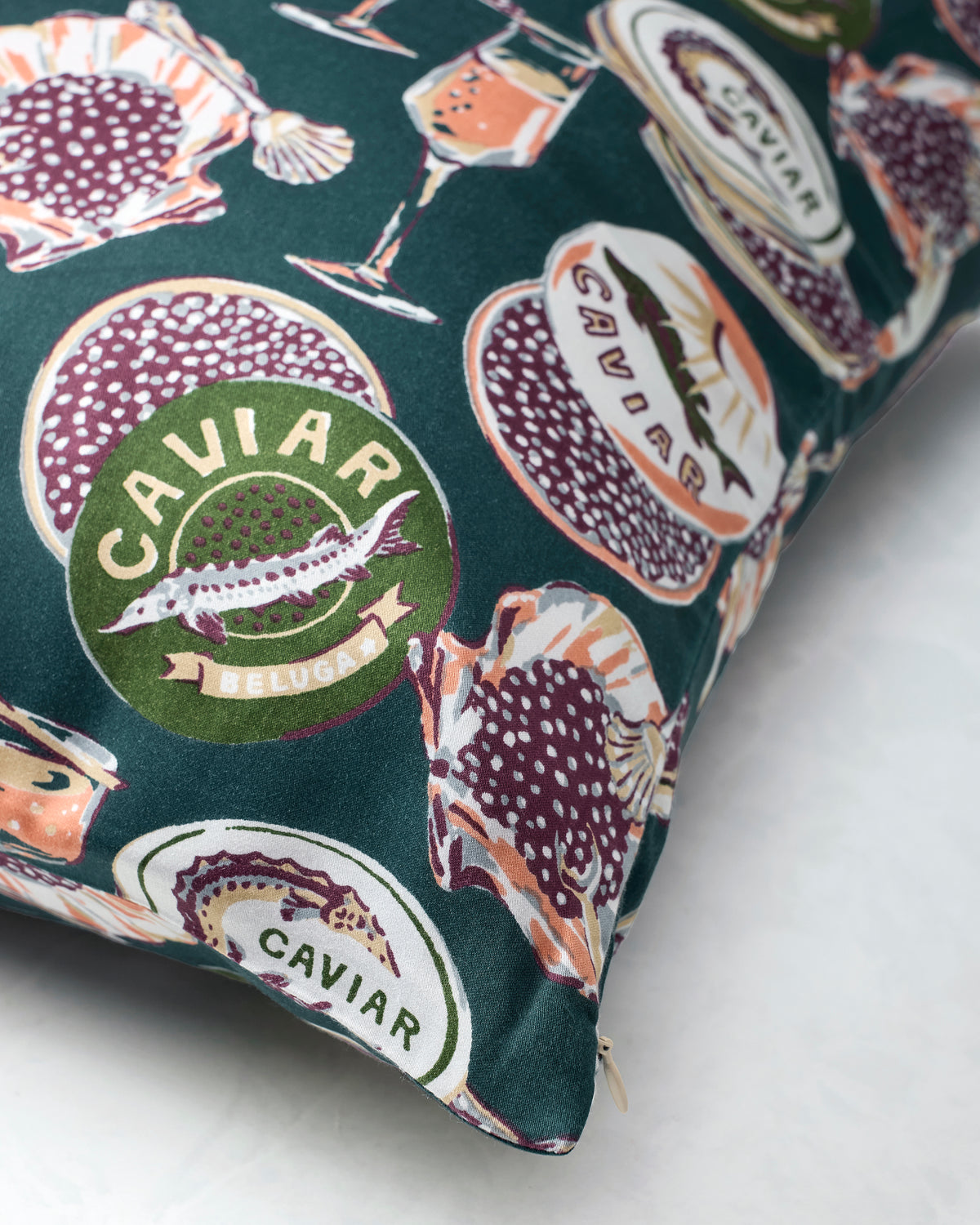 Close-up of the Champagne & Caviar Eco Satin pillowcase showing the printed fabric and zipper edge.