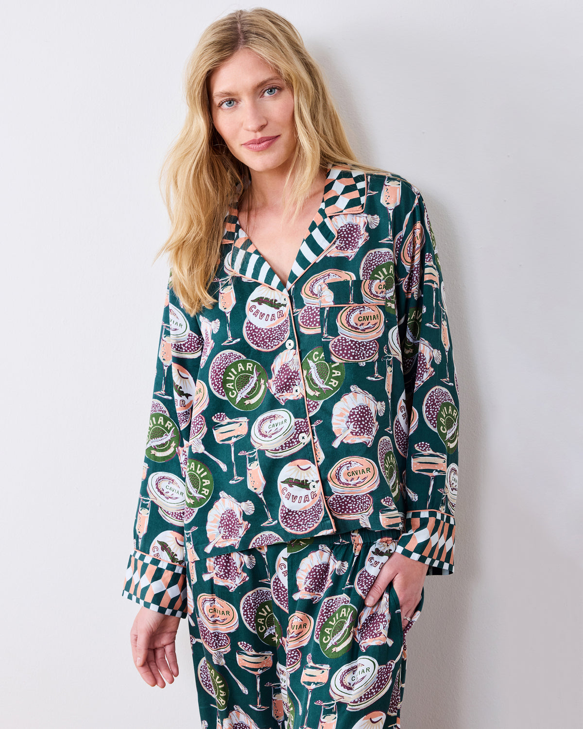 Front view of the Champagne & Caviar Soho pajama top with a notched collar, chest pocket, buttons, and patterned cuffs.
