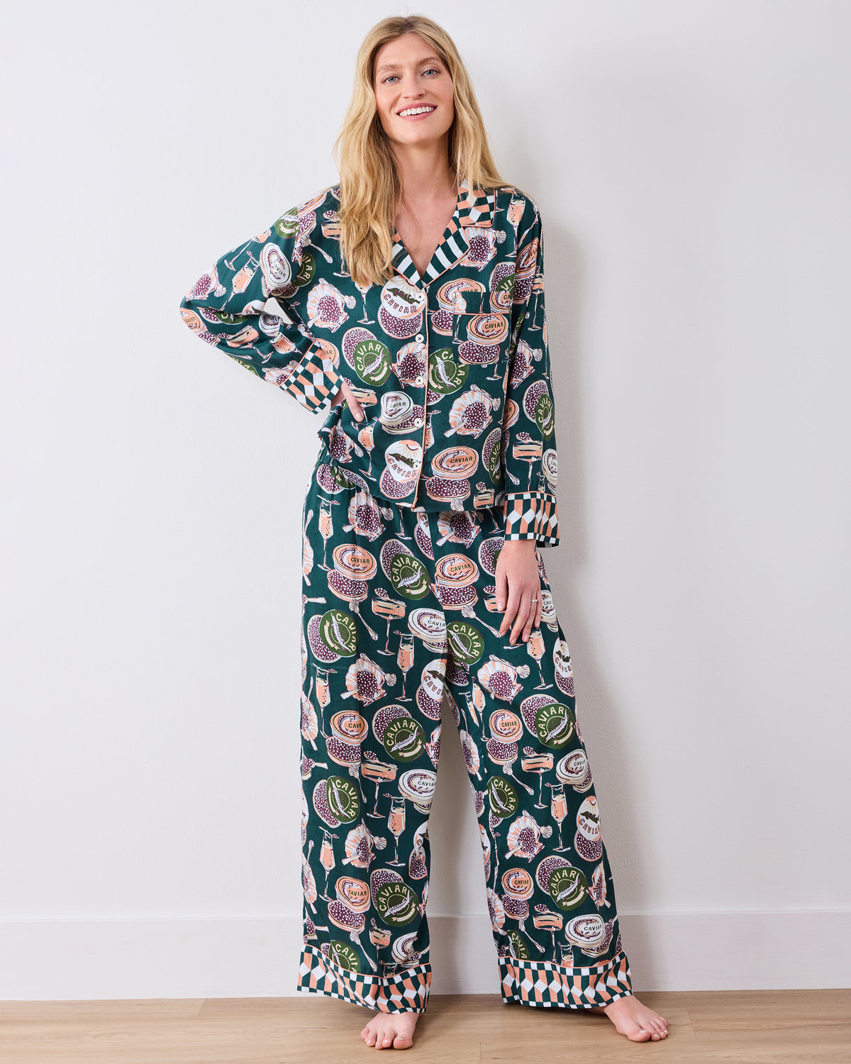 Full front view of the Champagne & Caviar Soho pajama set with a collared button-front top, patterned cuffs, and wide-leg pants.