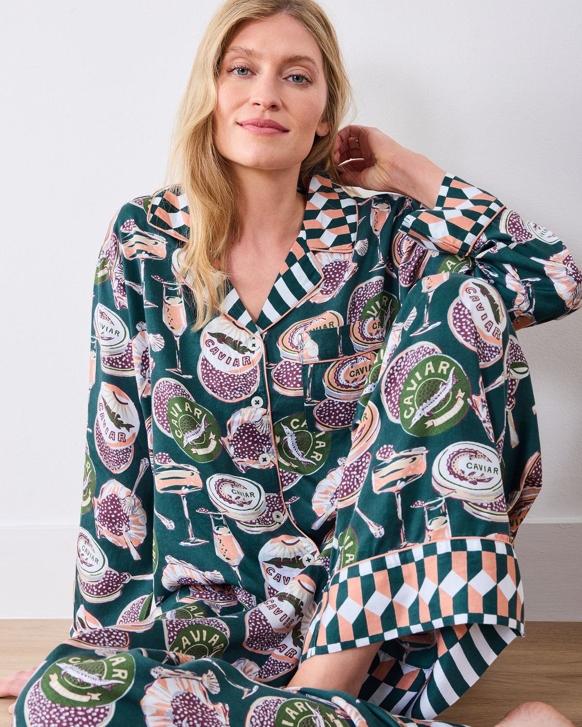 Front view of the petite Champagne & Caviar Soho pajama set with a button-front top, wide-leg pants, and contrasting geometric trim.