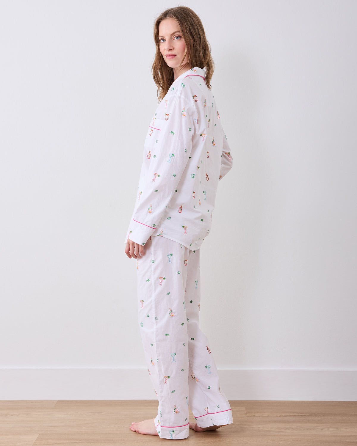 Side and back view of the Embroidered Tequila Sunrise long pajama set, showing the shirt and wide-leg pants from behind.