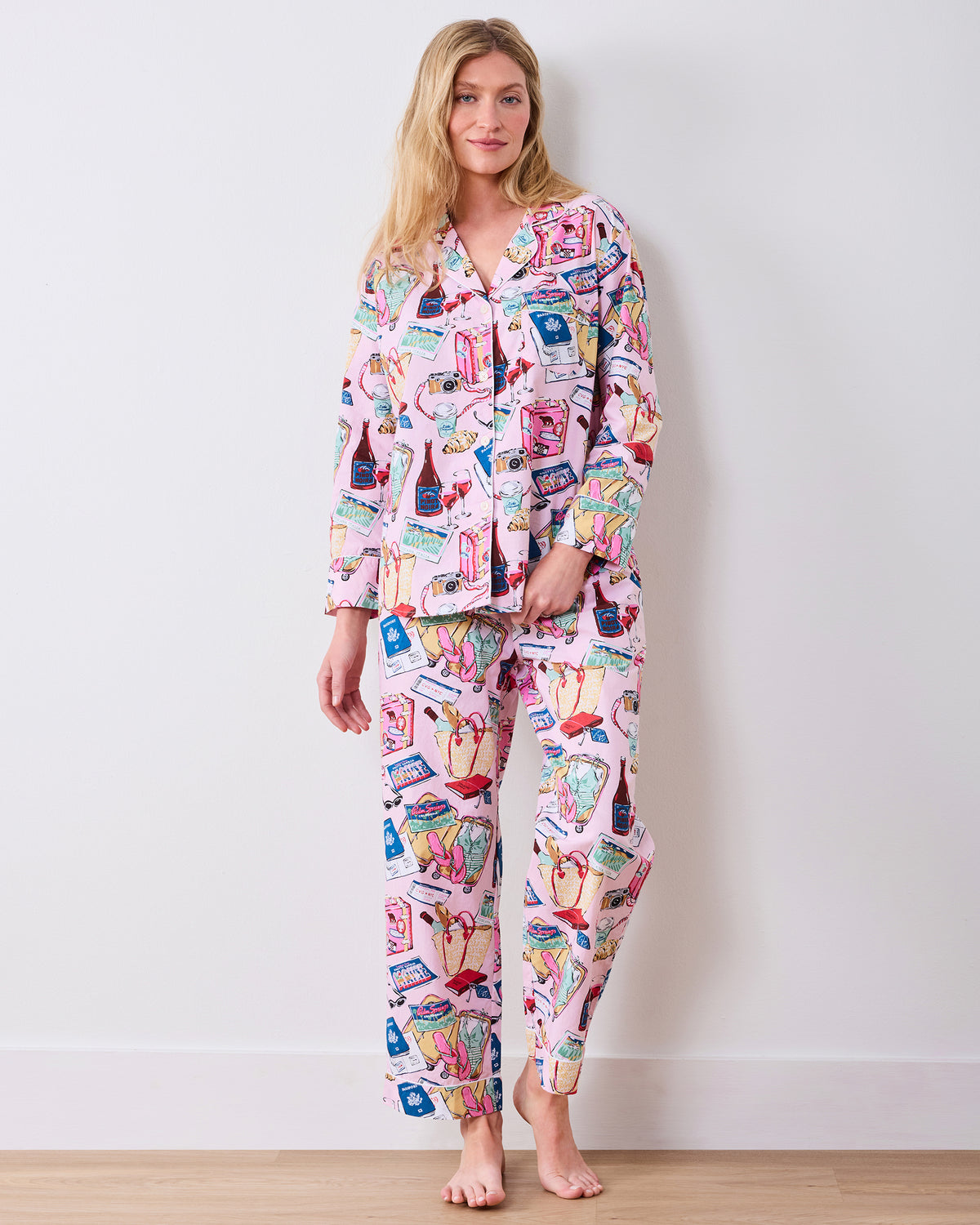 Full front view of the pink Emotional Baggage long pajama set with a relaxed button-down top and matching full-length pants.