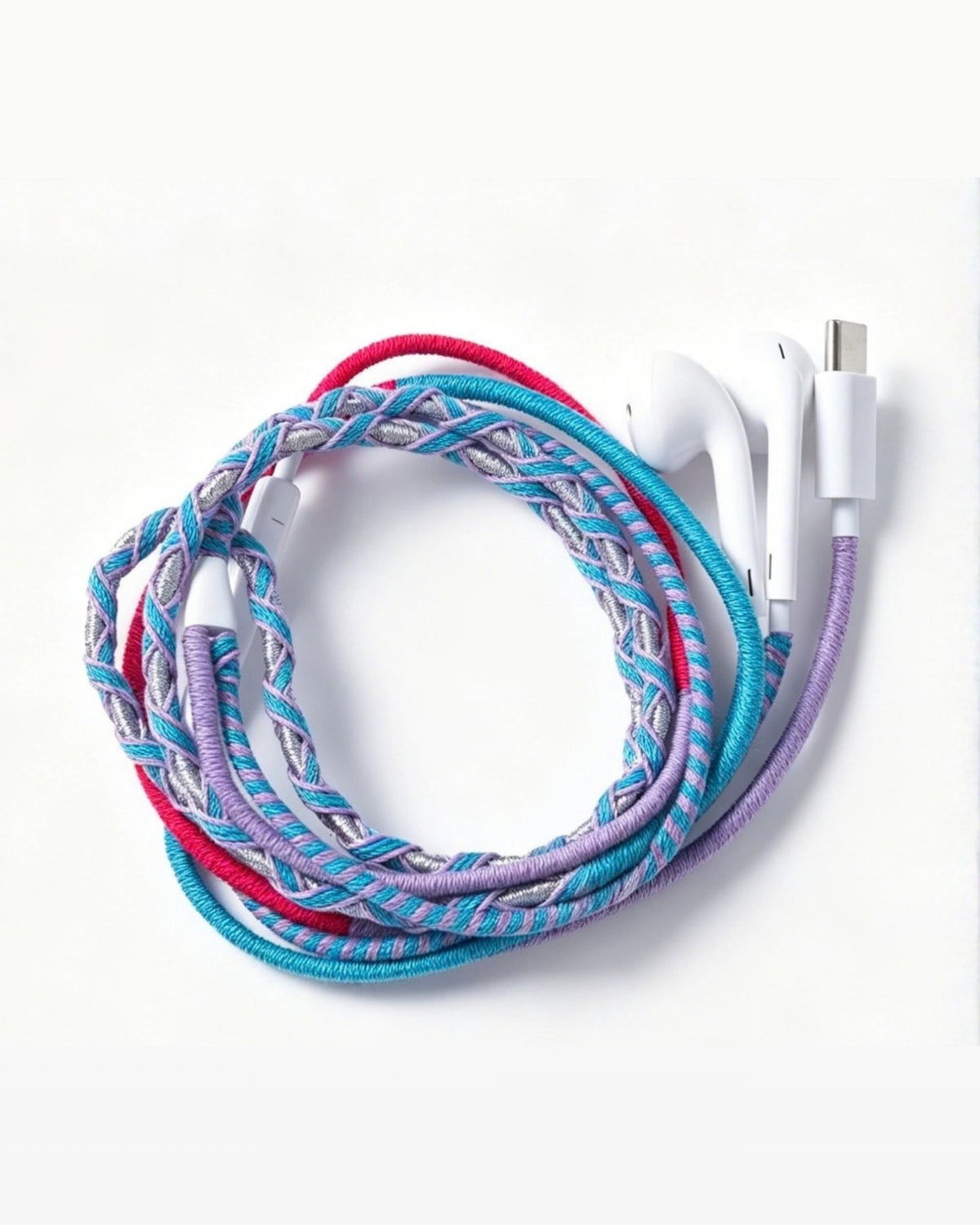 Coiled aqua, pink, and lavender wrapped USB-C in-ear headphones with white earbuds.