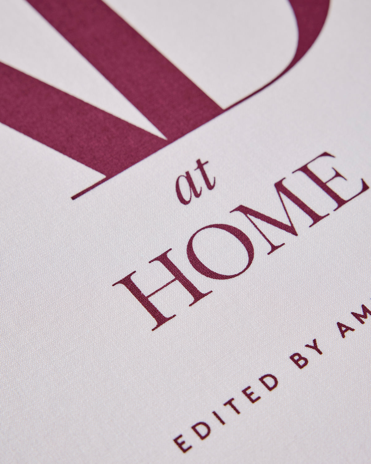 Close-up of the AD at Home book cover showing the words “AD at HOME” and partial editor credit.