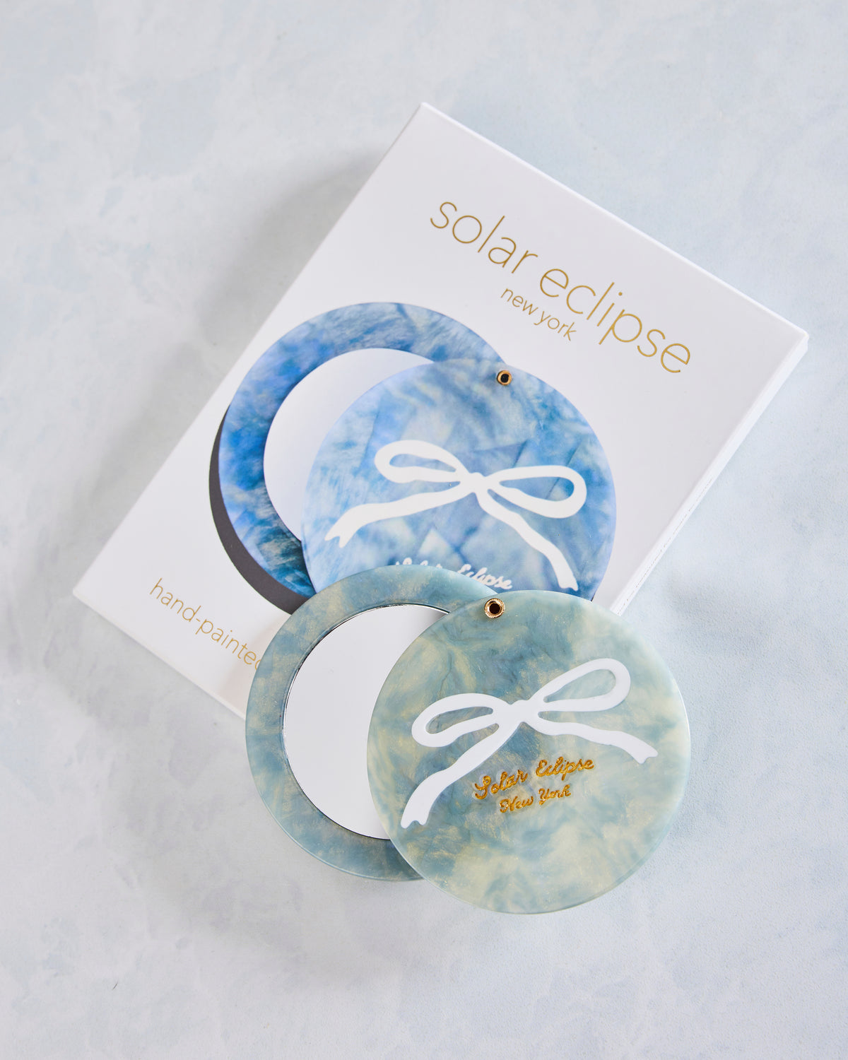 Solar Eclipse - Hand Painted Baby Blue Bow Compact Mirror - Baby Blue - Printfresh