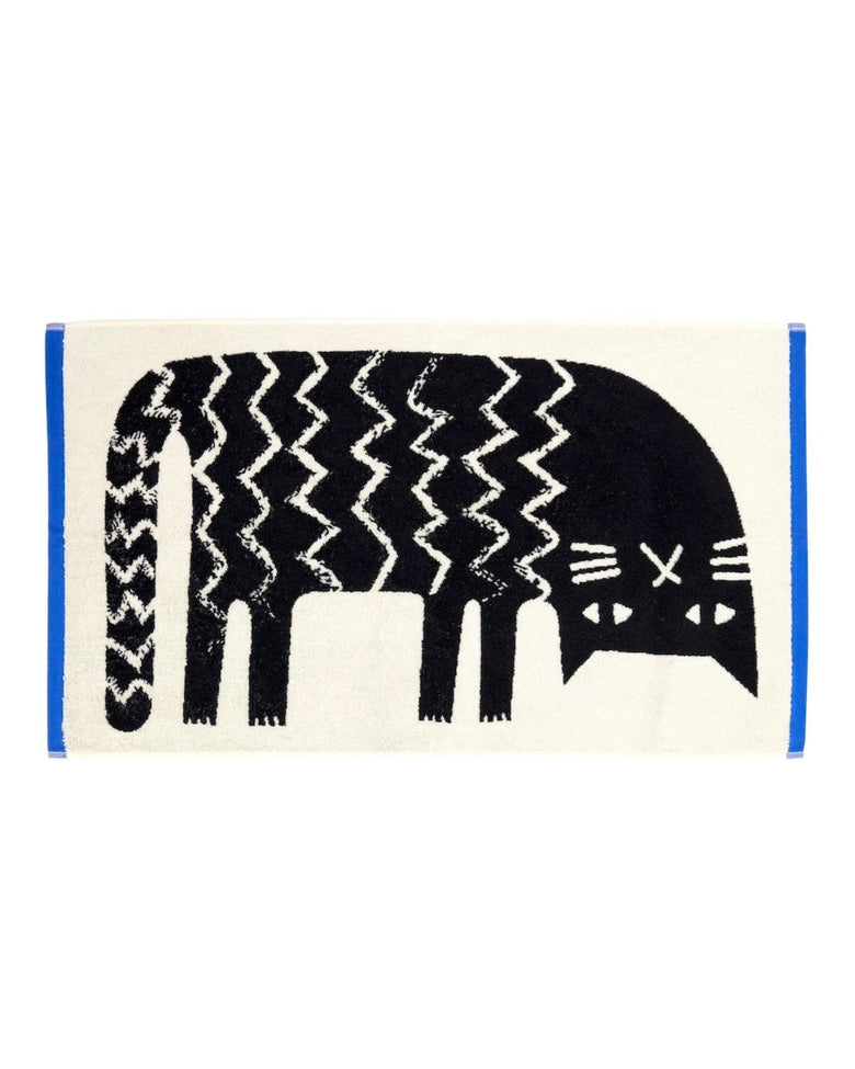 White hand towel with a black cat illustration and blue edging, shown flat against a white background.