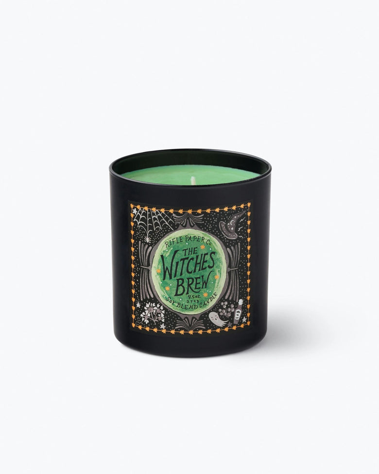 Front view of the black Witches Brew candle with green wax and an illustrated Halloween label.