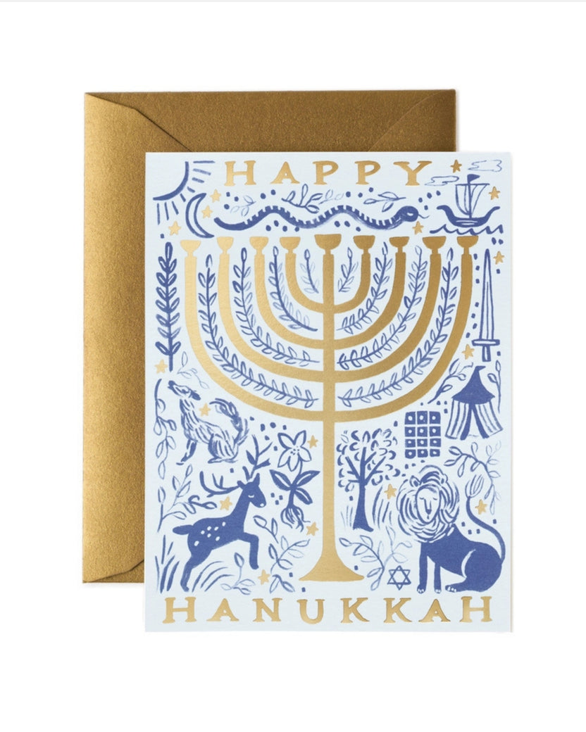 Hanukkah greeting card with a blue and gold menorah design, matching gold envelope, and the words “HAPPY HANUKKAH.”