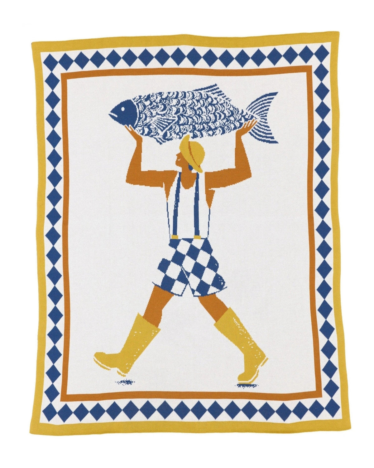 Un Beau Poisson knit throw showing a figure carrying a large fish, framed by blue diamond and yellow borders.