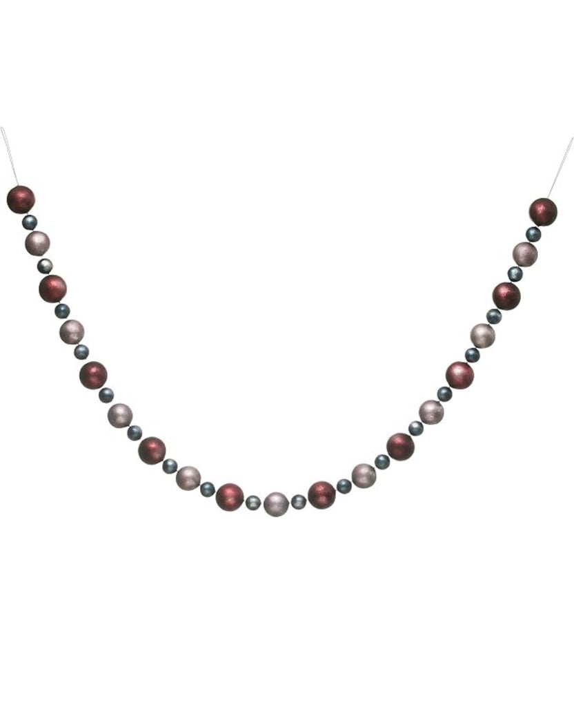 Christmas ball garland arranged in a wide U shape, with alternating burgundy, blue-gray, and mauve balls.