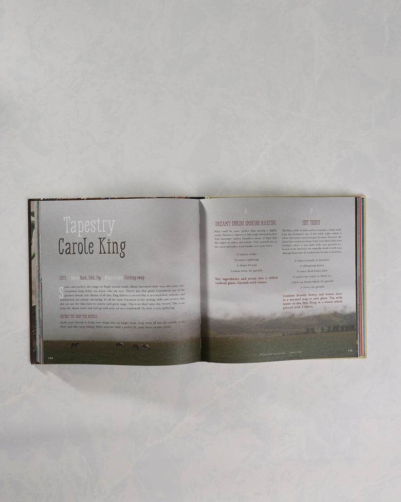 Open Booze & Vinyl book showing a Carole King entry with cocktail recipes on the facing page.