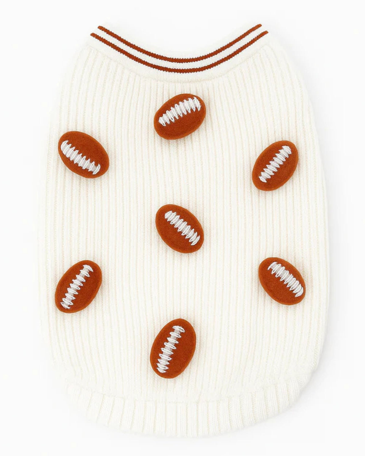 Front view of an ivory dog sweater with six brown football appliqués
