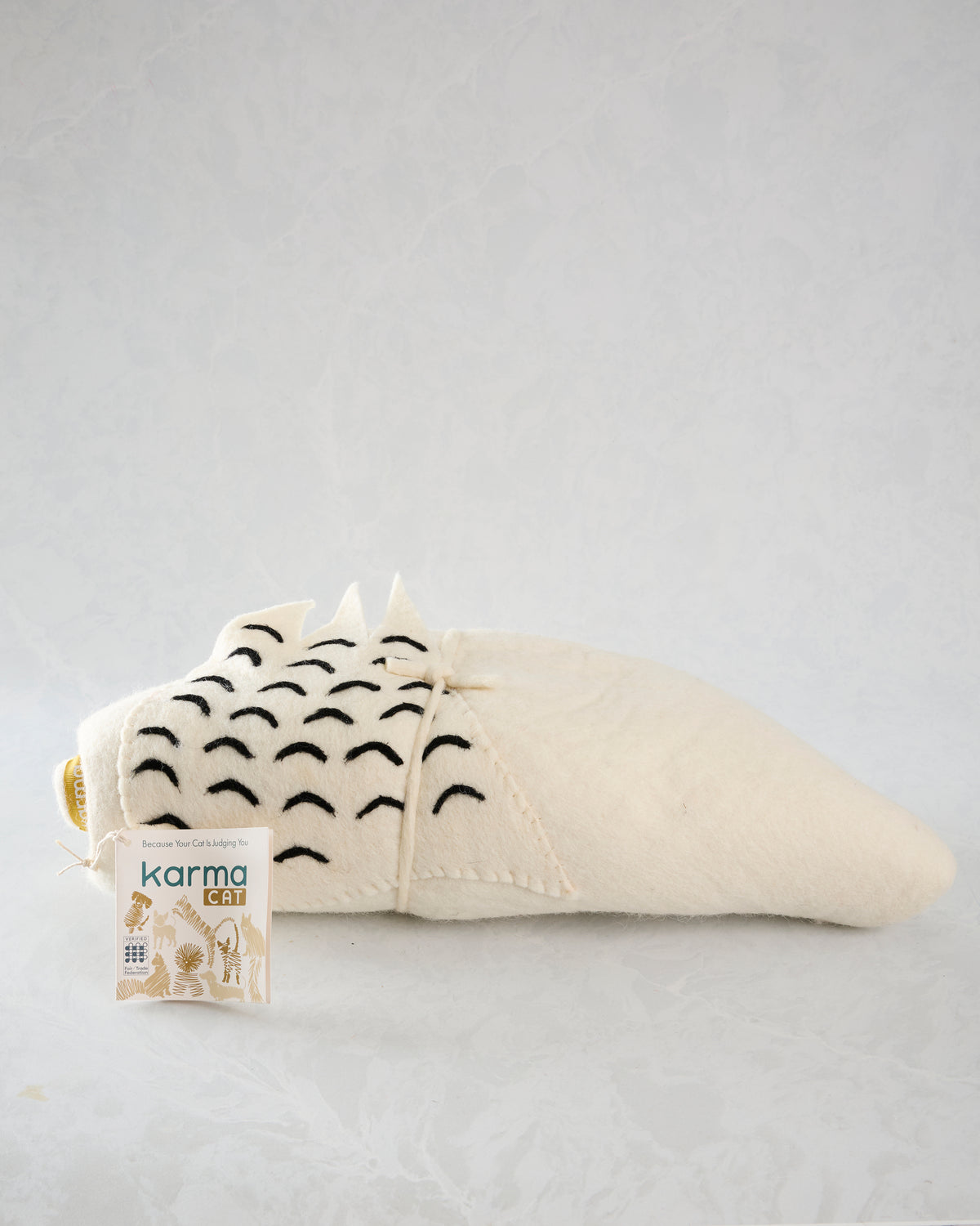 Ivory owl pet cave shown from the side, with patterned wings and a product tag.