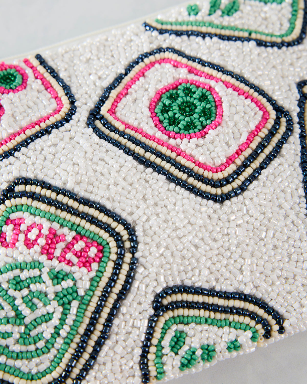 Close-up of the Mahjong coin purse front showing colorful beaded tile motifs.