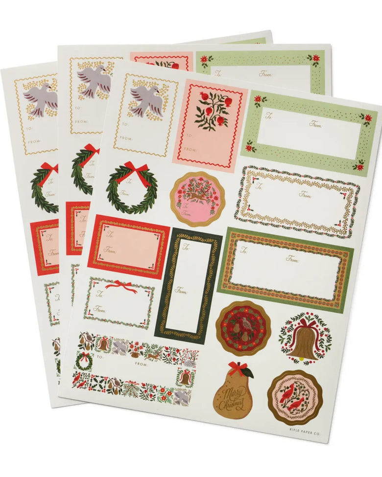 Three sheets of holiday stickers and gift labels with colorful borders, wreaths, birds, bells, and other festive illustrations.