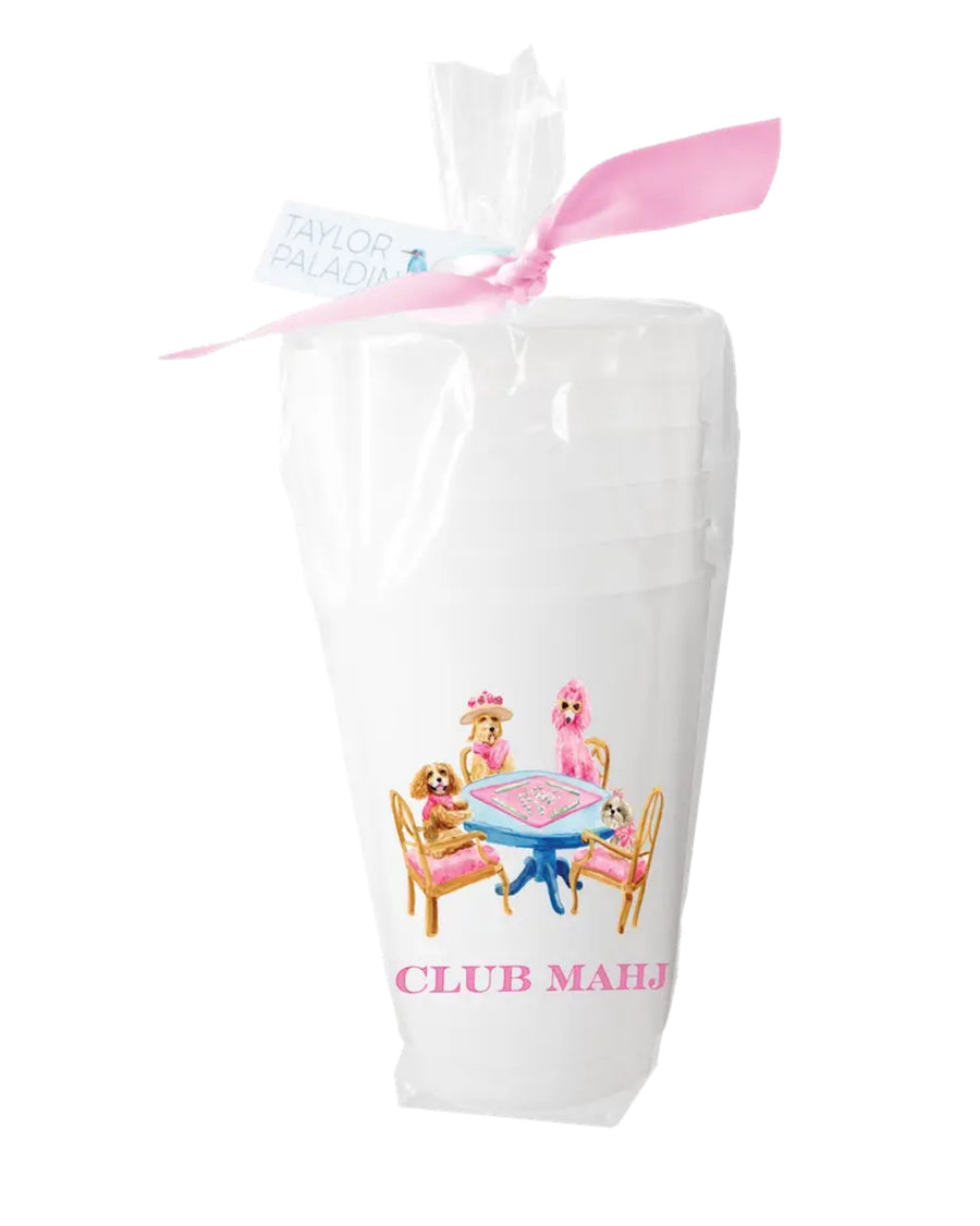 White frosted cup with a pink ribbon, an illustration of dogs gathered around a Mahjong table, and pink lettering.