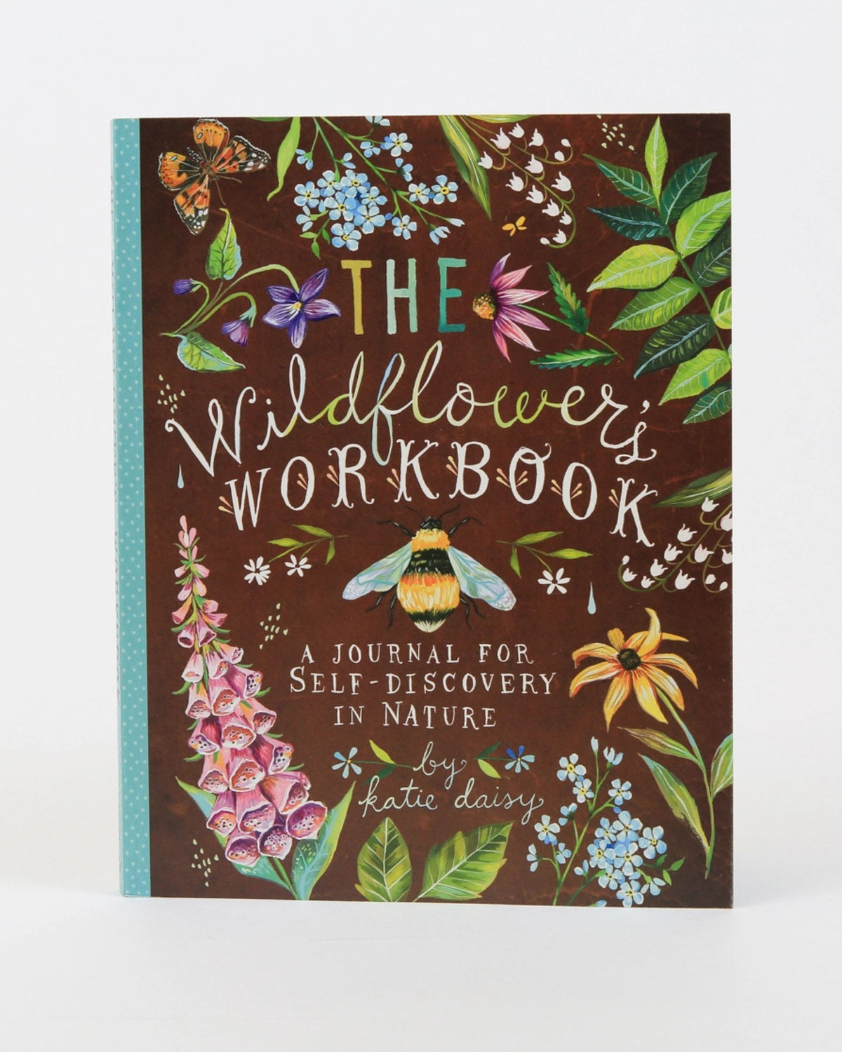 Front view of The Wildflower's Workbook with botanical illustrations, a butterfly, a bee, and a turquoise spine.