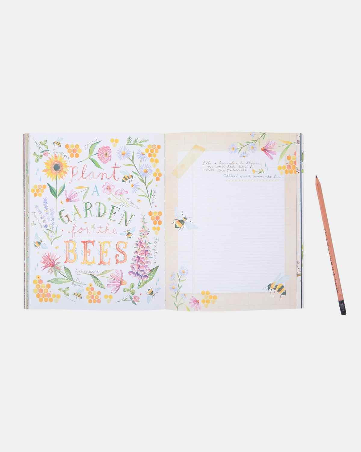 Open Wildflower's Workbook showing a floral garden illustration and a lined writing page with bees and flowers.
