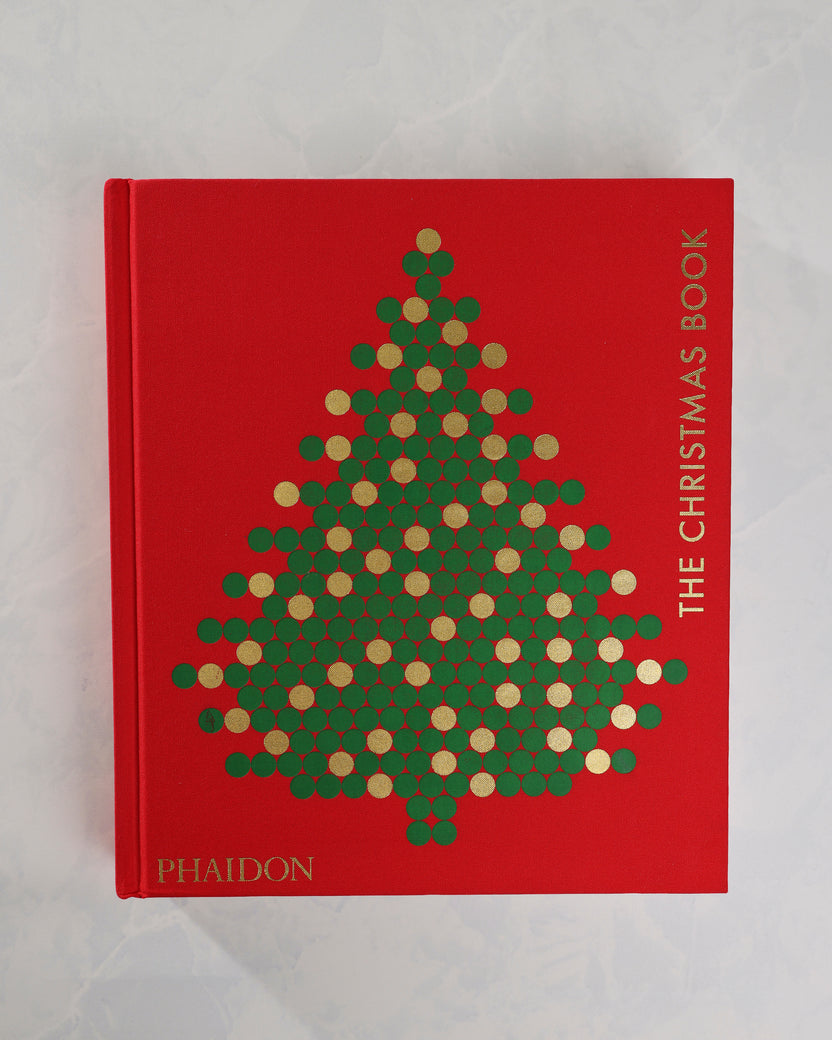 Front cover of The Christmas Book by Phaidon, in red with a green-and-gold Christmas tree design and vertical gold title lettering.
