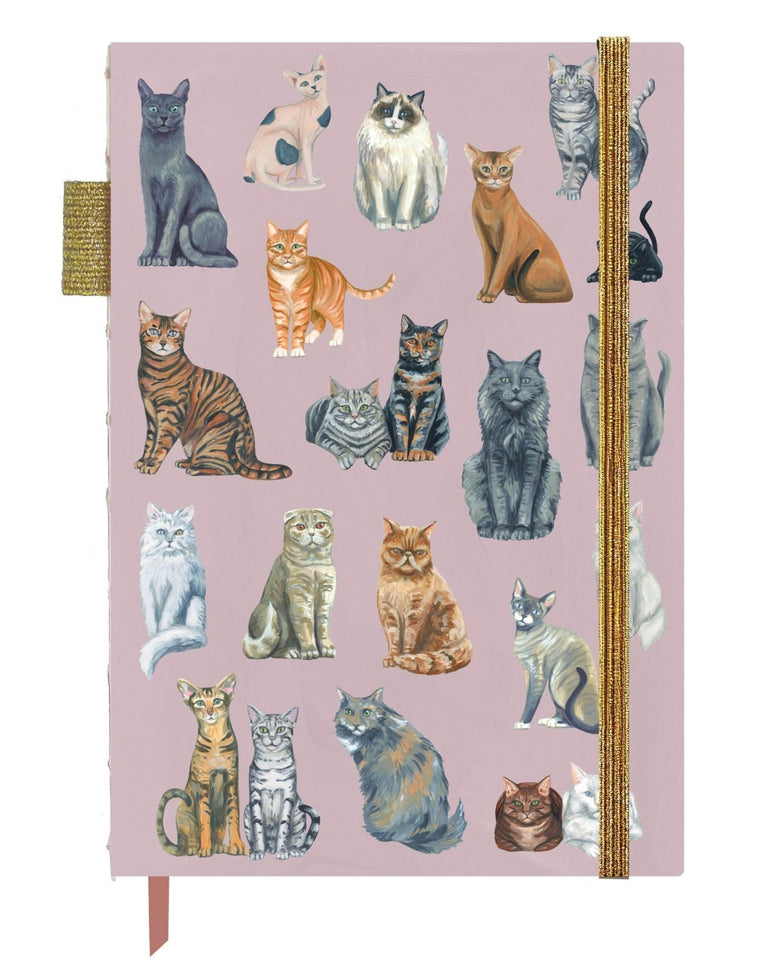 Pink lay-flat journal with an illustrated cover featuring cats in various colors and poses.