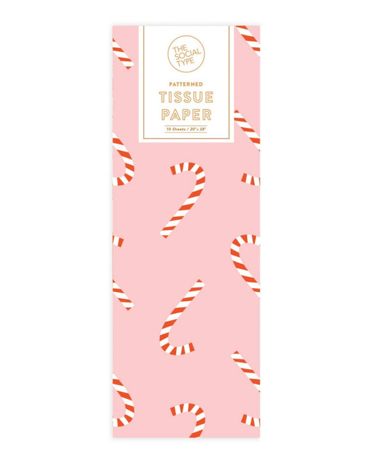 Pink candy cane patterned tissue paper package labeled “PATTERNED TISSUE PAPER,” containing 10 sheets sized 20 by 28 inches.
