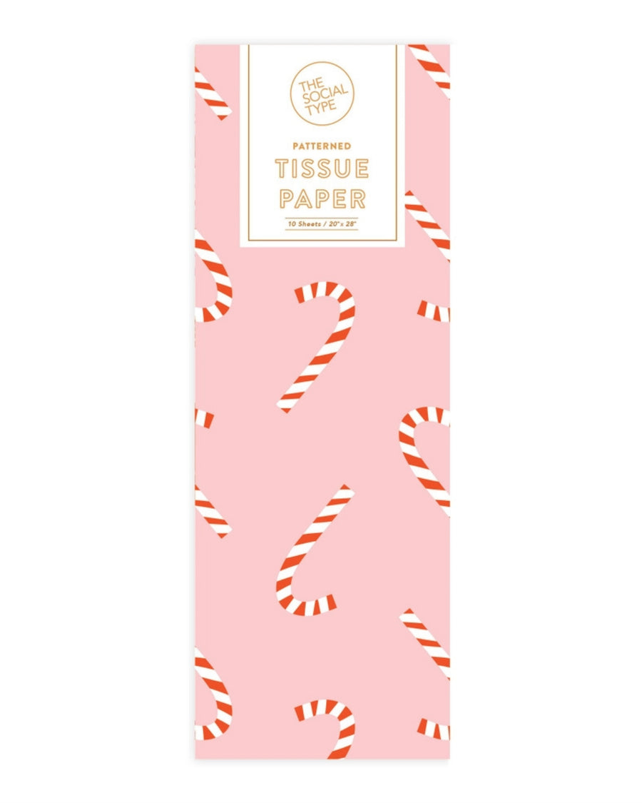 Pink candy cane patterned tissue paper package labeled “PATTERNED TISSUE PAPER,” containing 10 sheets sized 20 by 28 inches.