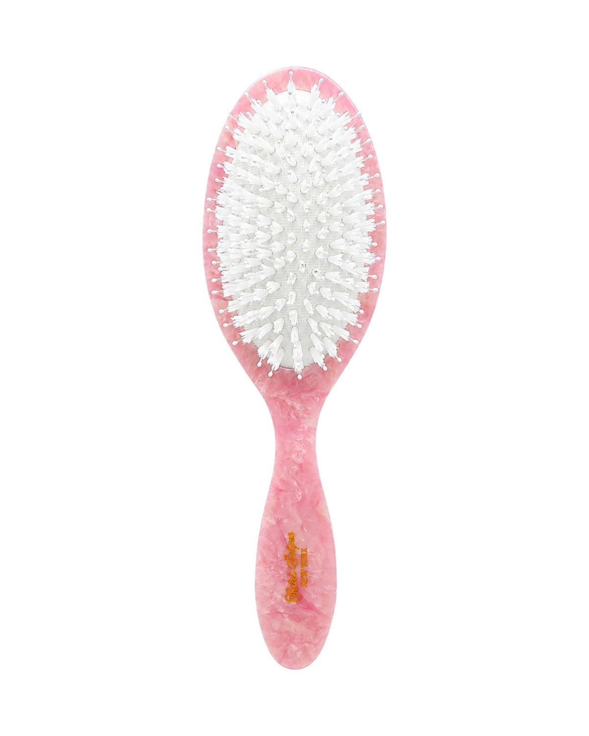 Front view of the pink brush, showing its white bristles and pink handle.