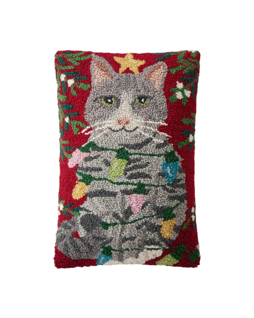 Rectangular red hook pillow with a gray cat wrapped in colorful Christmas lights and a gold star